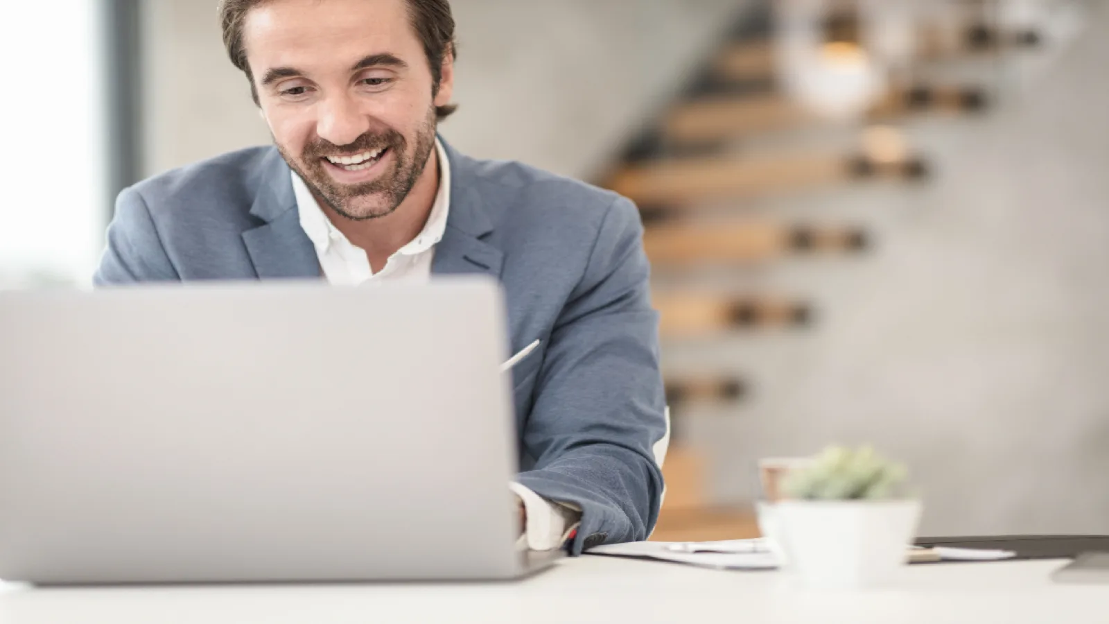 A person working at a laptop