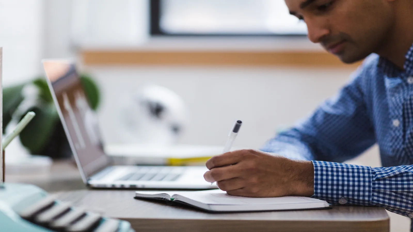 A person working at a laptop