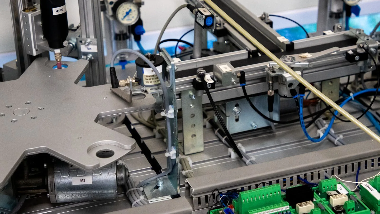 A precision automated-assembly cell on a manufacturing floor